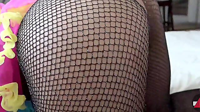 Spanking Leads to a Cumshot on Her Fishnets Ass